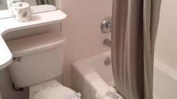Room, 1 King Bed | Bathroom | Combined shower/tub, free toiletries, hair dryer, towels