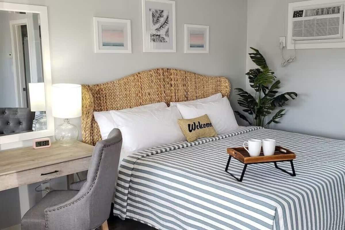 Habitación Deluxe | Muebles diferentes, tabla de planchar con plancha y wifi gratis
