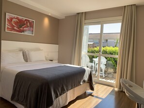 Habitación doble Deluxe | Minibar, cortinas blackout, insonorización y wifi gratis 