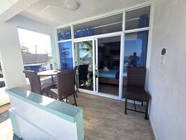 VA 102a Junior Ocean View Suite, 1 Full/Twin Size Bunk Bed, Ocean Front  Property | Living area | Flat-screen TV