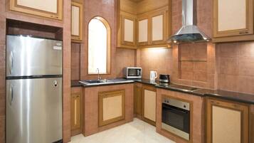 Deluxe 2 bedroom villa with private pool and jacuzzi | Private kitchen | Full-sized fridge, microwave, stovetop, dishwasher