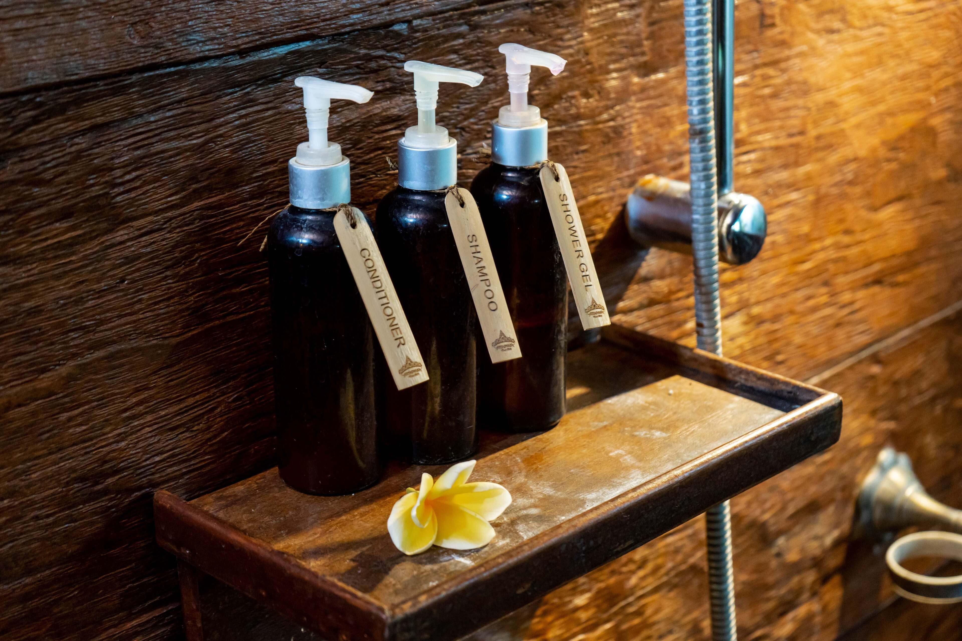 suite room | bathroom | separate bathtub and shower, rainfall showerhead, free toiletries