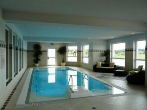Indoor pool, sun loungers