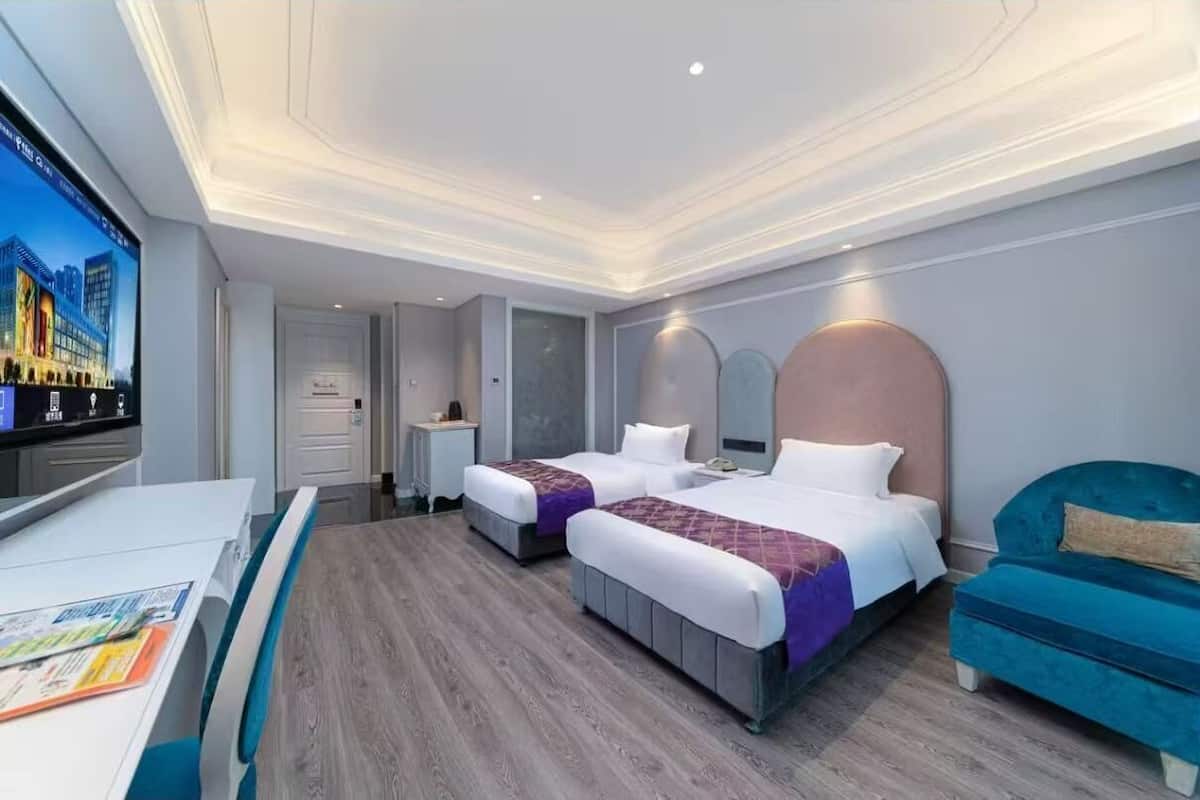 Family Room, 2 Double Beds (Classic) | In-room safe, individually decorated, desk, iron/ironing board