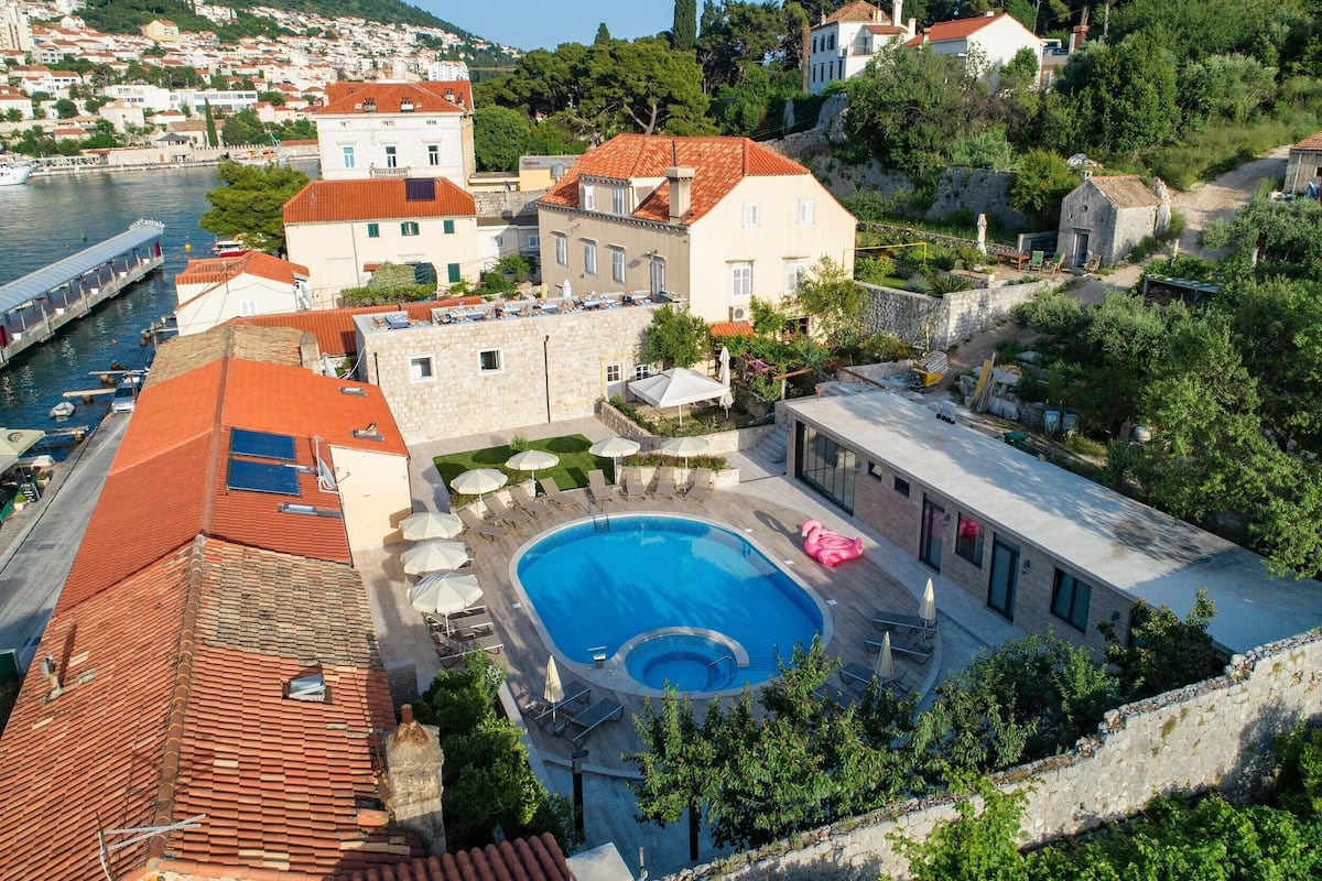Seasonal outdoor pool, pool umbrellas, pool loungers