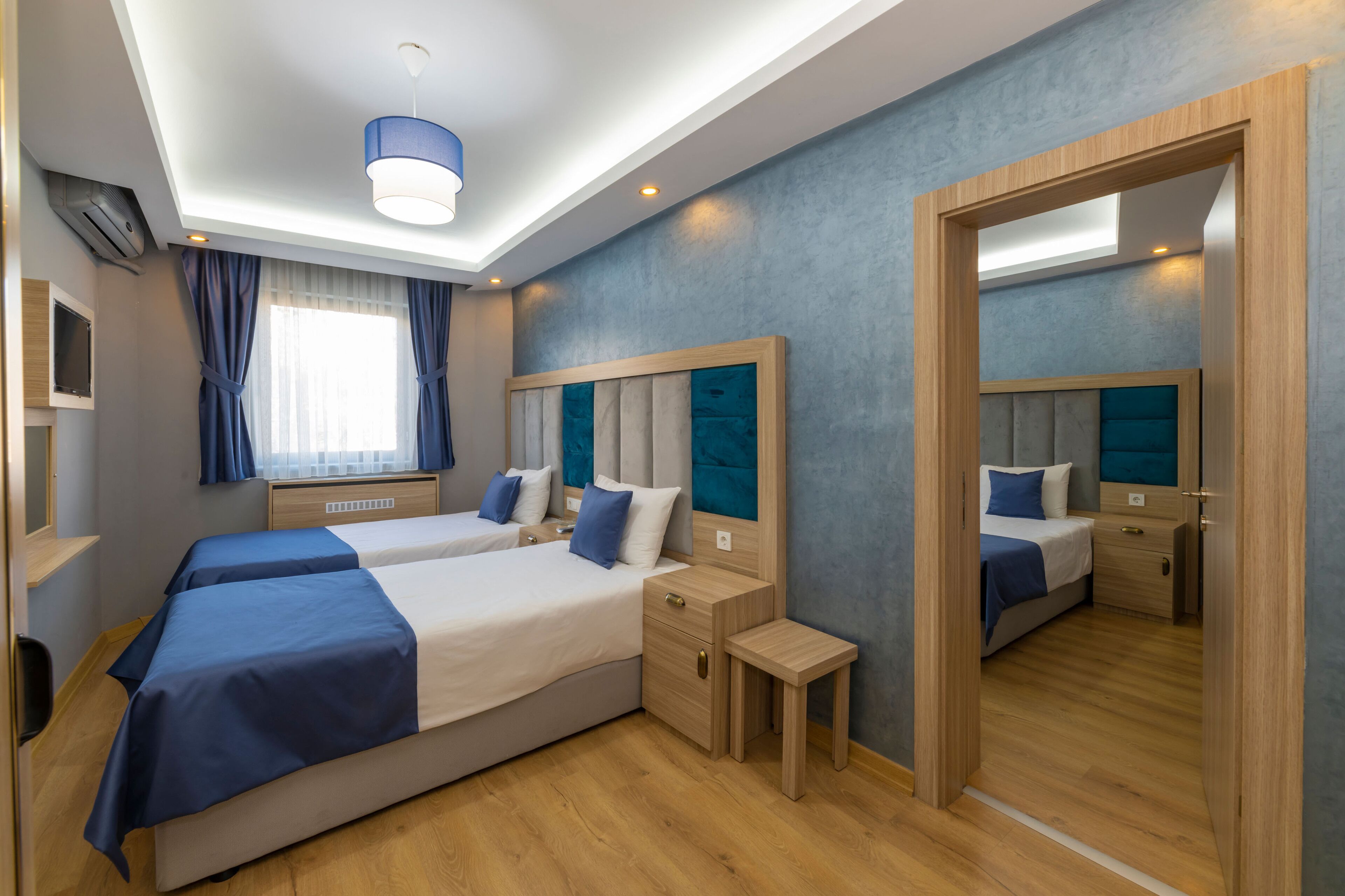 Family Room, 2 Bedrooms, Courtyard View | Egyptian cotton sheets, premium bedding, minibar, in-room safe