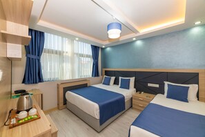 Familierom, 2 soverom, bakgårdsutsikt | Sengetøy i egyptisk bomull, sengetøy av topp kvalitet og minibar