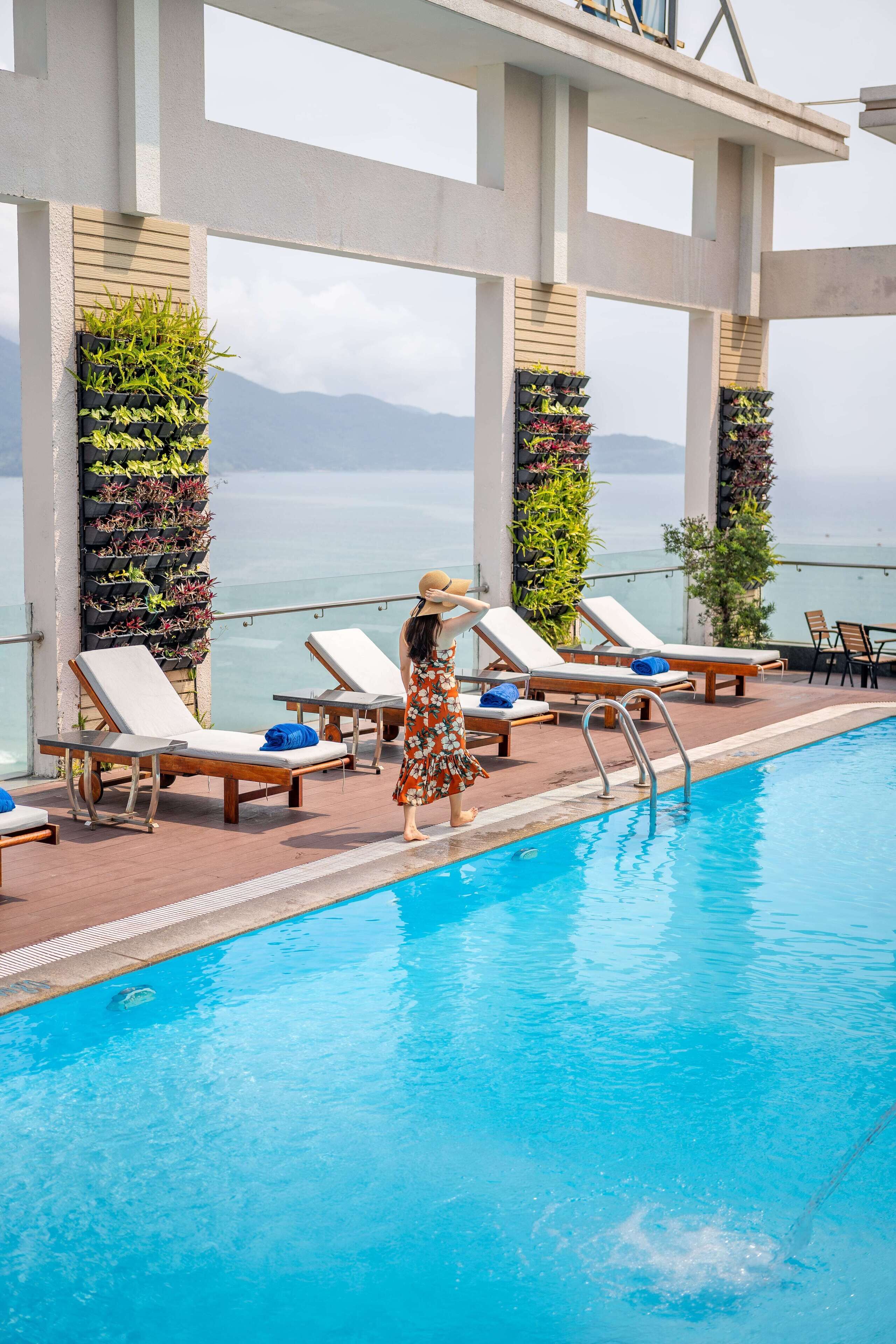 outdoor pool, pool umbrellas, pool loungers