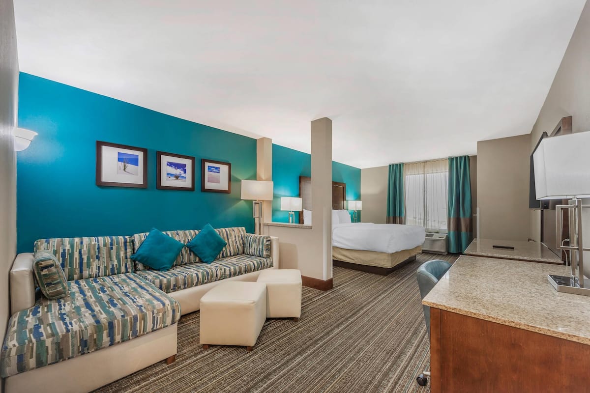 Suite, 1 King Bed with Sofa bed, Non Smoking | Pillowtop beds, desk, iron/ironing board, free cribs/infant beds