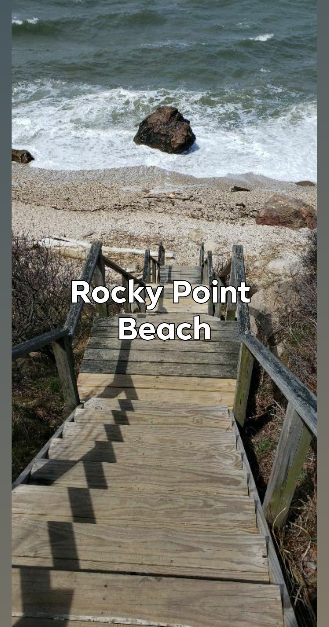 A wooden staircase leading to Rocky Point Beach.