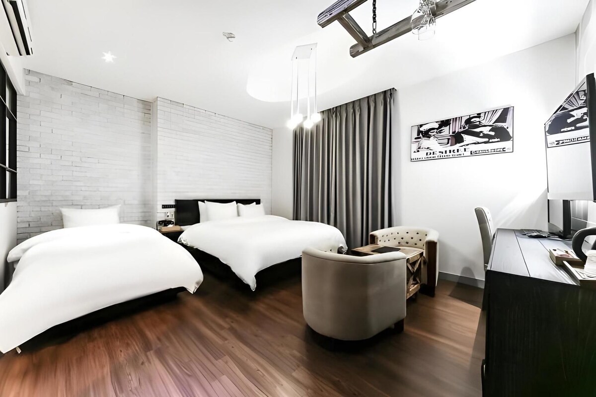 Premium bedding, down comforters, blackout drapes, soundproofing