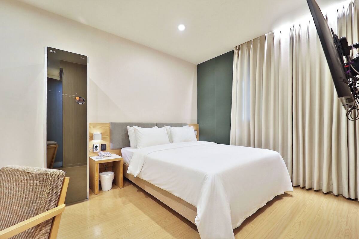 Premium Double Room | Premium bedding, down comforters, laptop workspace, blackout drapes