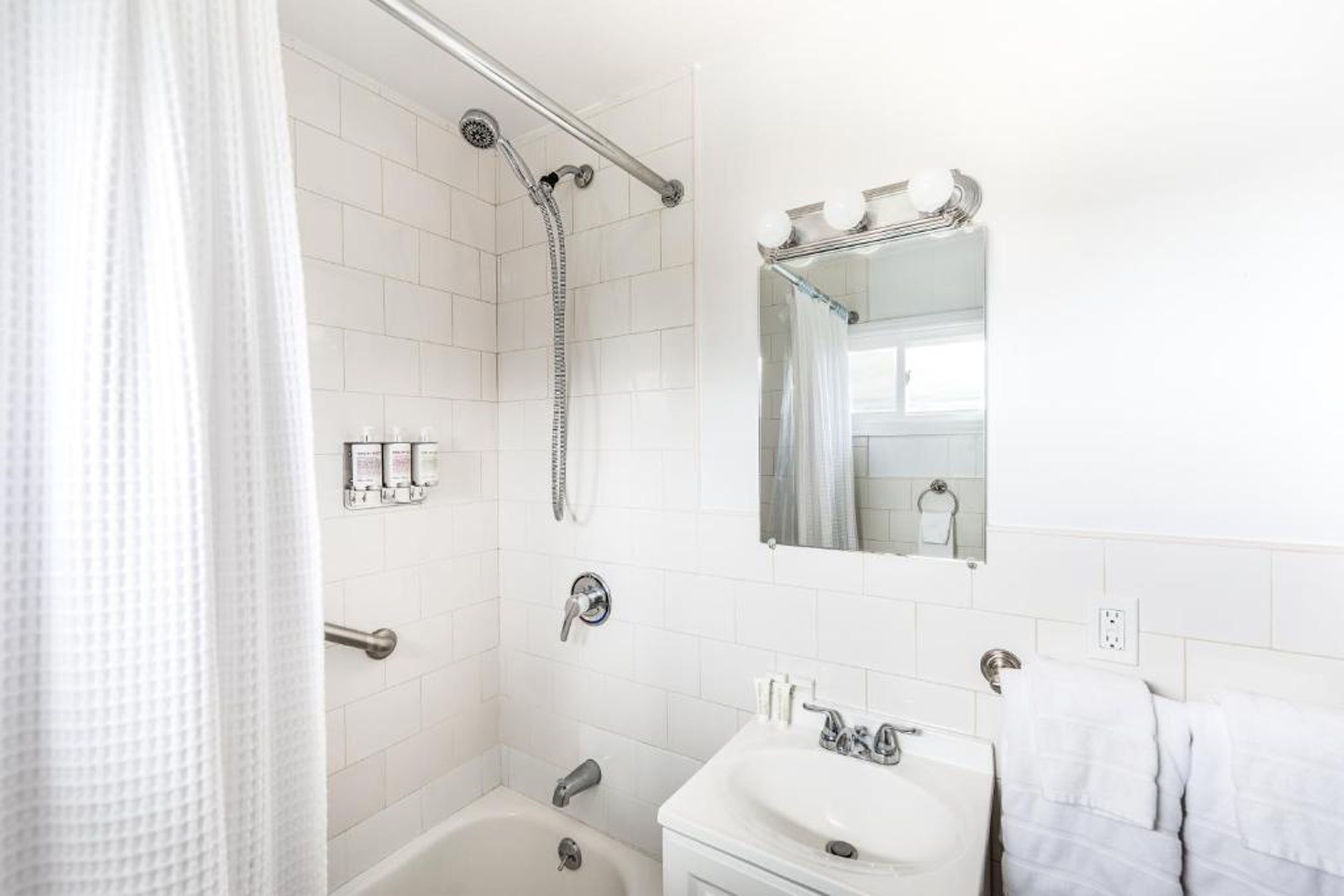 deluxe double room | bathroom | designer toiletries, hair dryer, bathrobes, towels