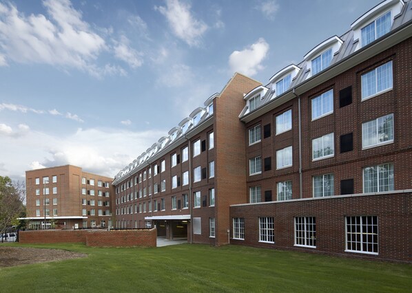 A multi-story brick building with a flat roof and large windows. - Residence Inn Durham McPherson/Duke University Medical Cntr (Durham)