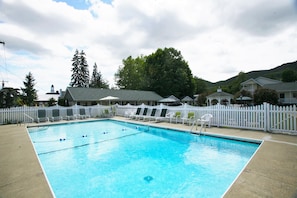 Outdoor pool, open 10 AM to 10 PM, pool umbrellas, sun loungers