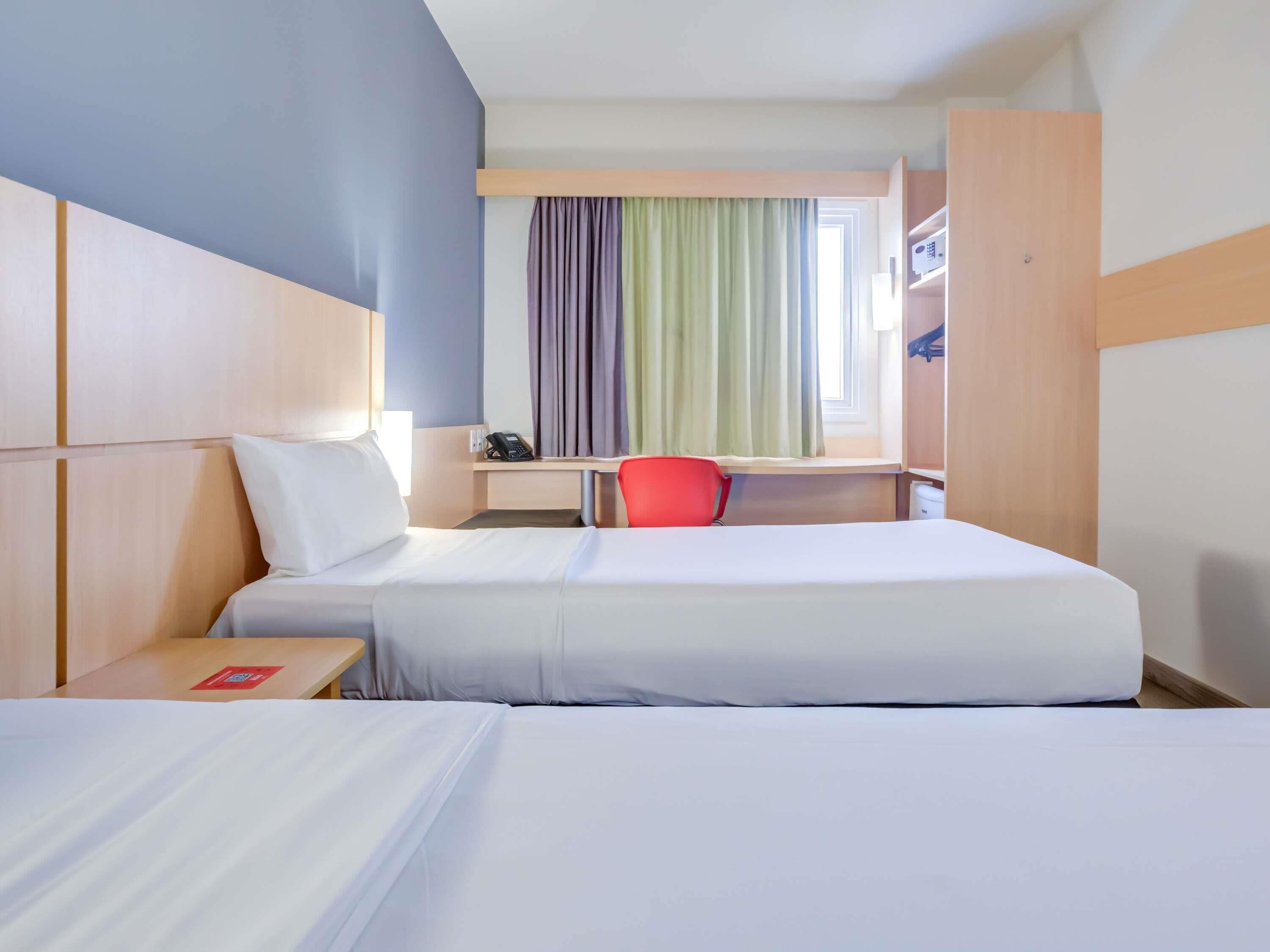 standard apartment, 2 single beds | in-room safe, desk, laptop workspace, blackout curtains