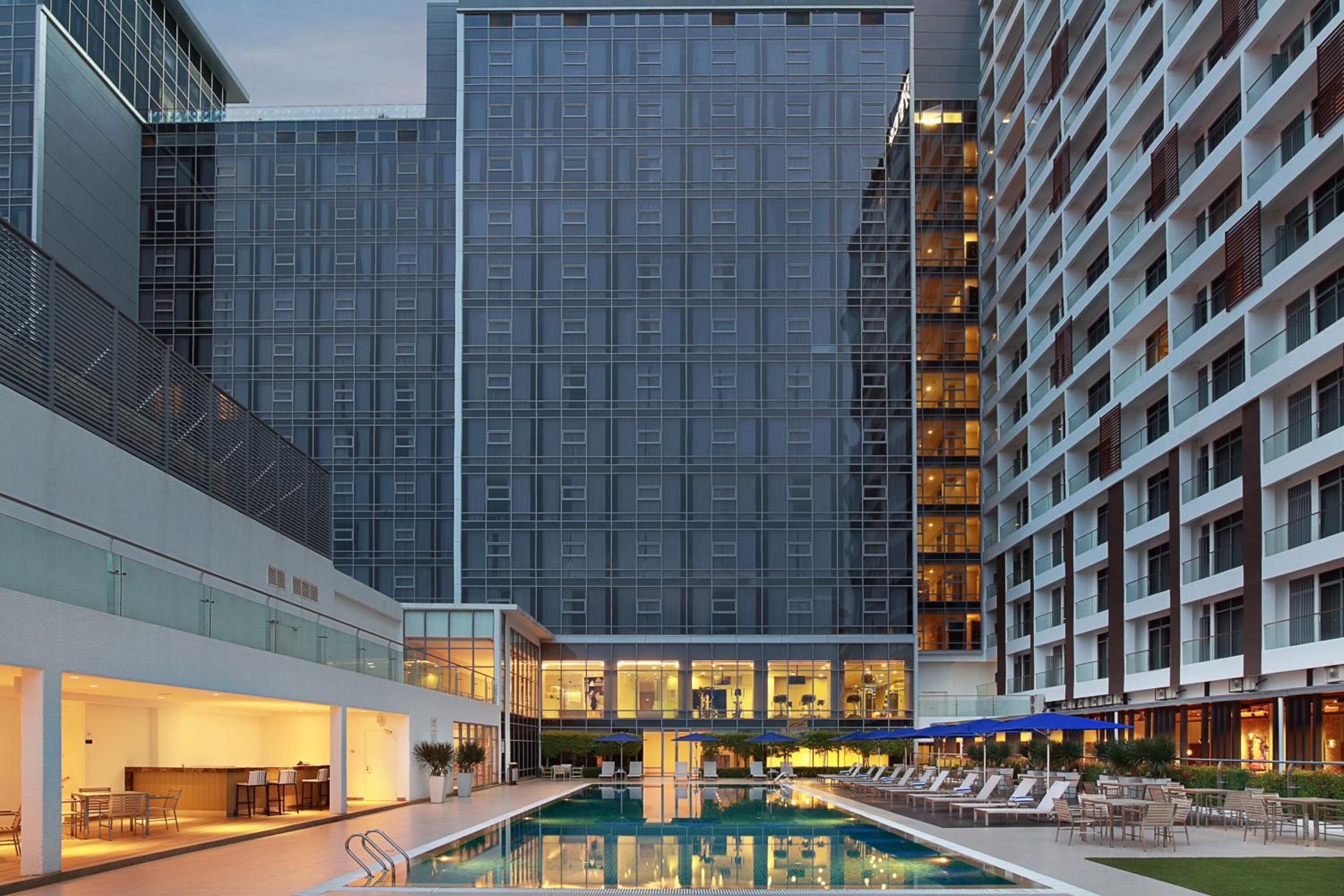 Outdoor pool, pool umbrellas, pool loungers