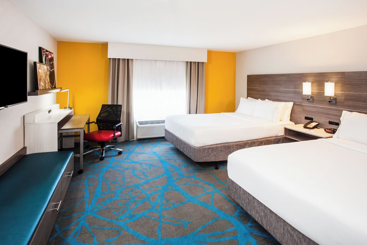 Luxe beddengoed, een kluis op de kamer, een bureau