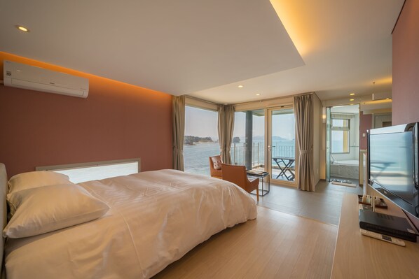 Habitación Deluxe | Edredón, wifi gratis y ropa de cama