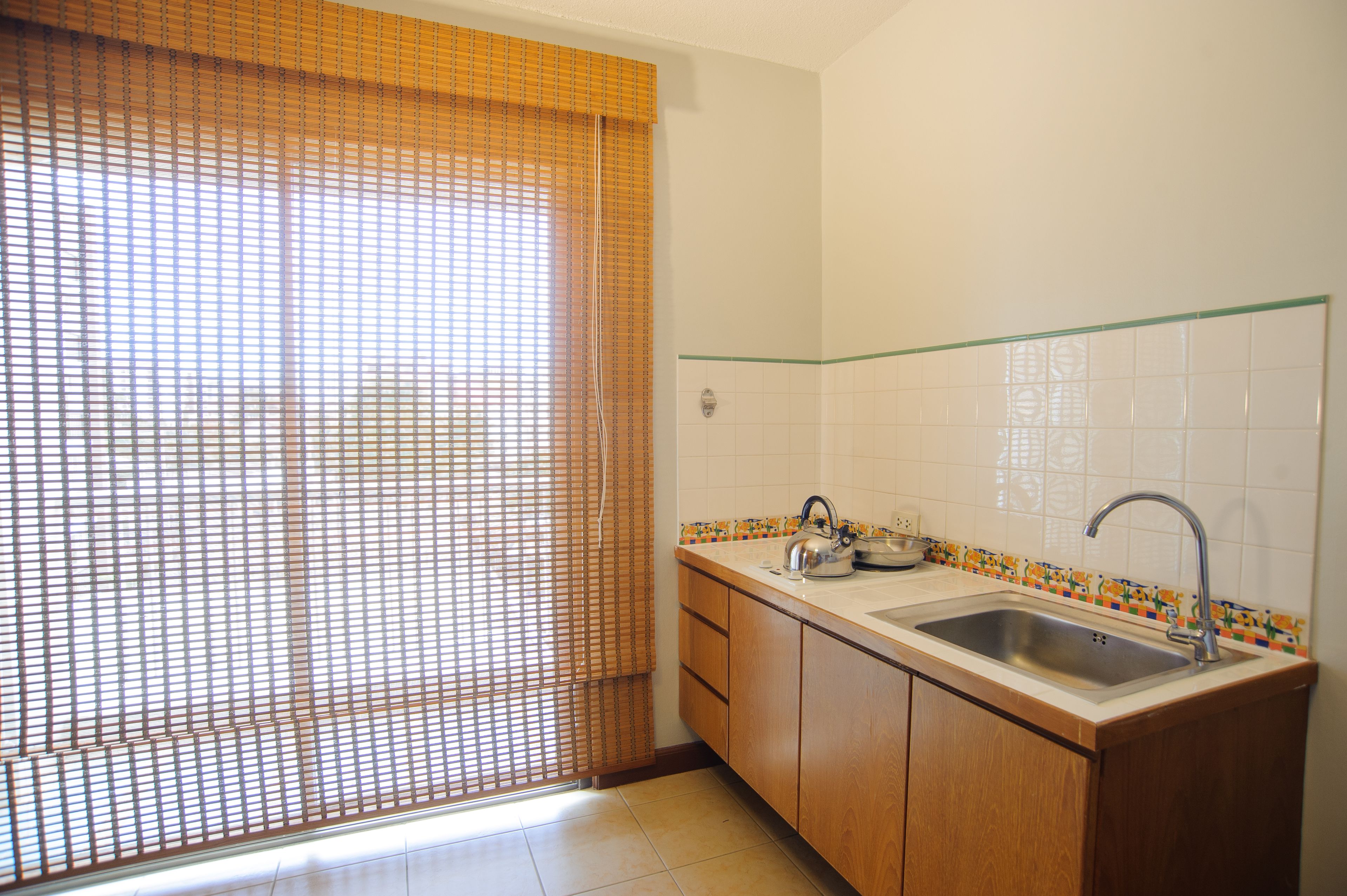 deluxe room, 1 king bed | private kitchenette | fridge