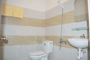 Shower, free toiletries, hair dryer, towels