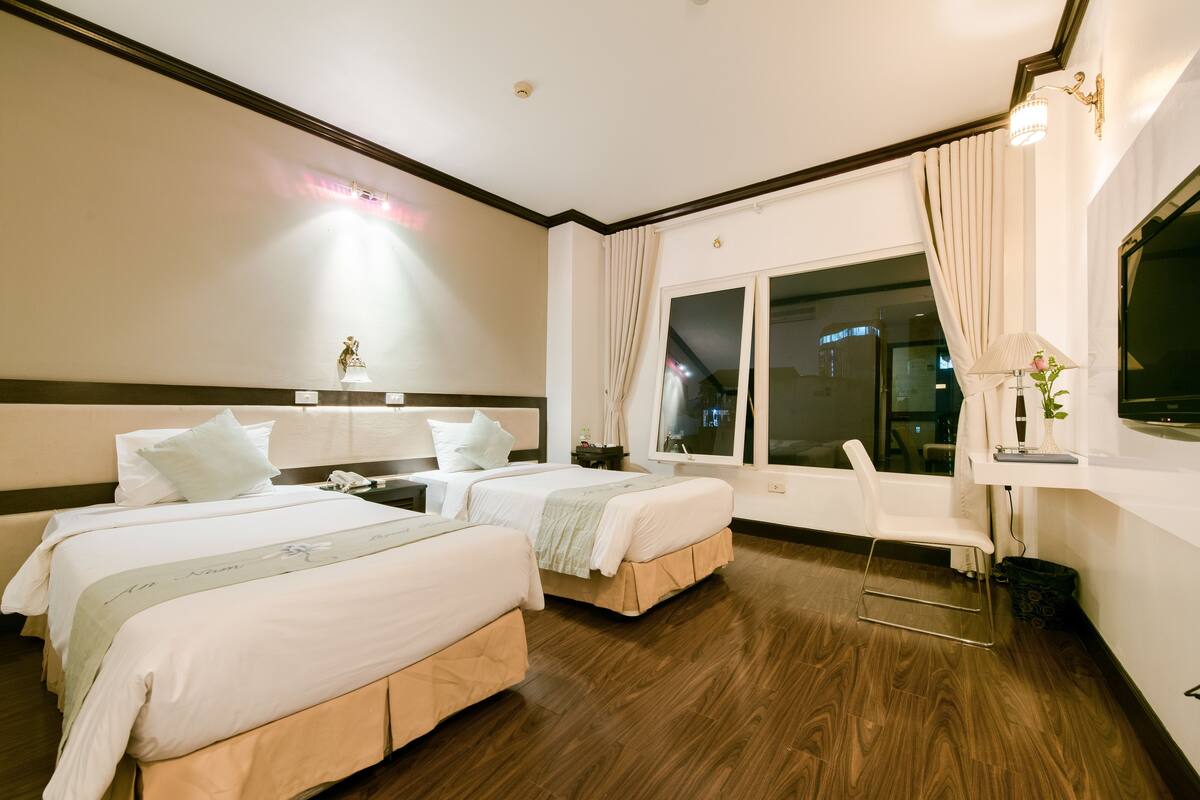 Deluxe Double Room | Minibar, in-room safe, desk, iron/ironing board (on request)