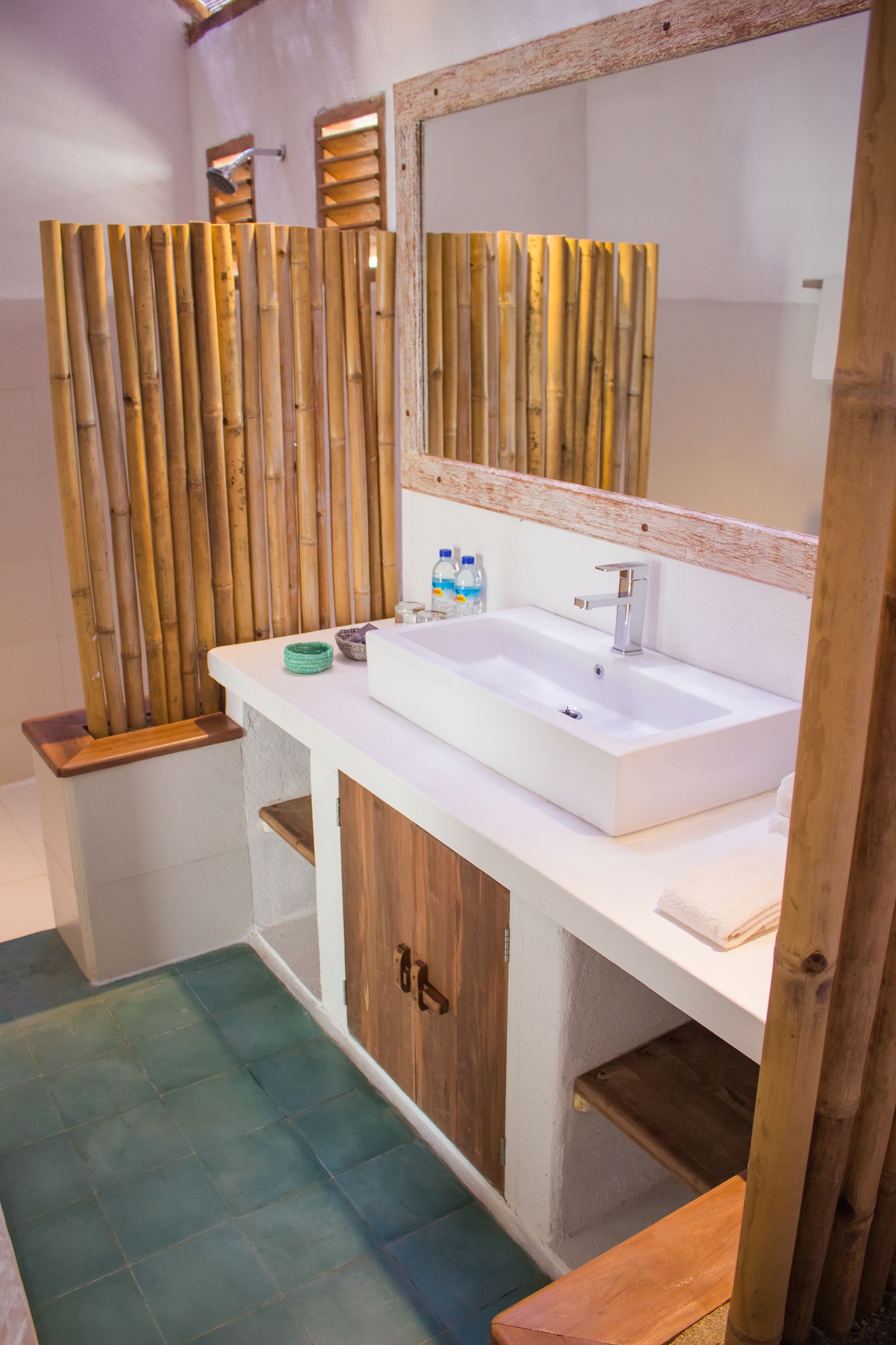 deluxe room | bathroom | shower, designer toiletries, hair dryer, towels