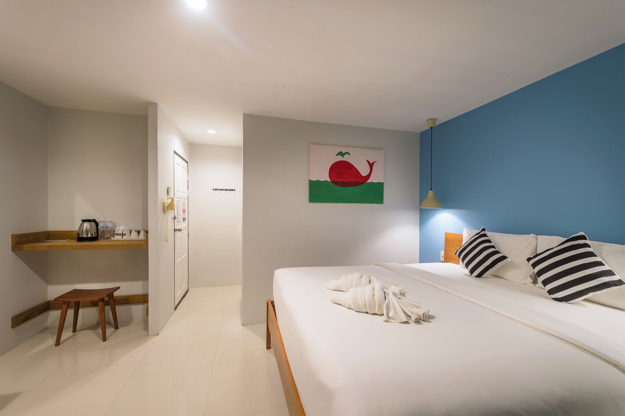 superior king balcony | premium bedding, individually decorated, desk, laptop workspace