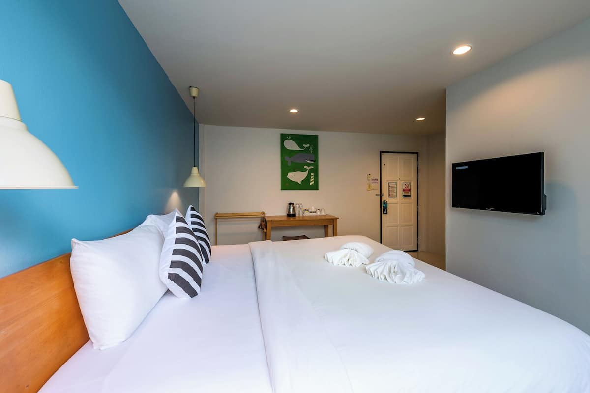 deluxe king | premium bedding, individually decorated, desk, laptop workspace