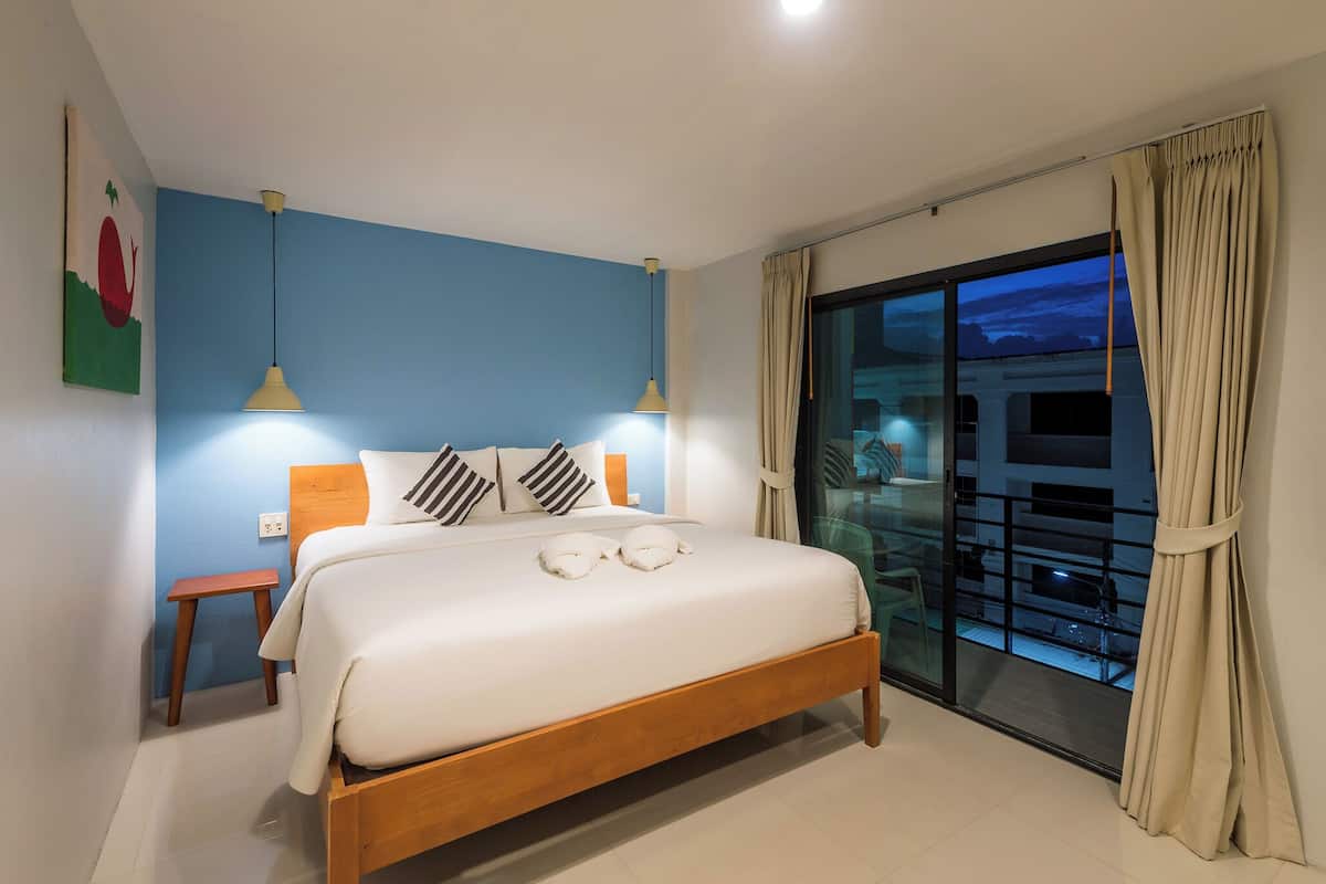 Superior King Balcony | Premium bedding, desk, laptop workspace, blackout drapes