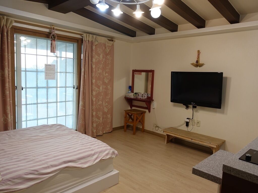 Standard Room | Living area | 42-inch LED TV with digital channels, TV, pay movies