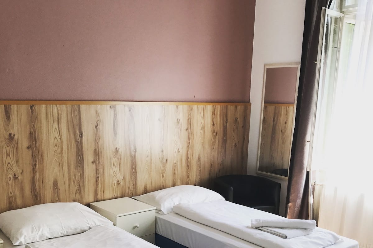 Classic Triple Room, 1 Bedroom, Non Smoking, Private Bathroom | Living area | TV