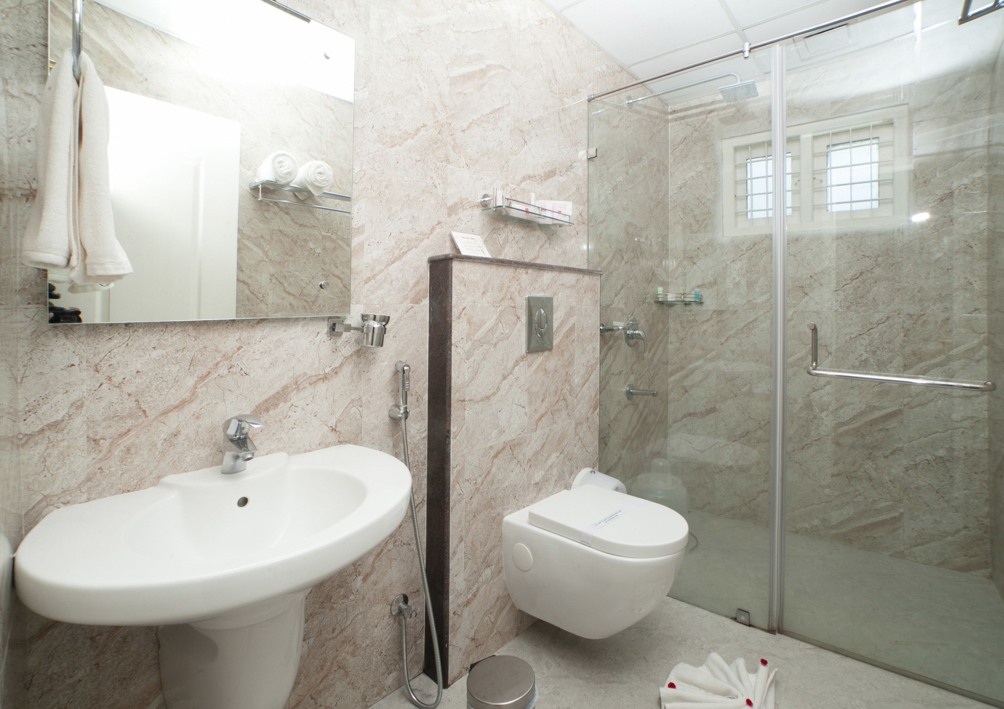 shower, rainfall showerhead, designer toiletries, hair dryer