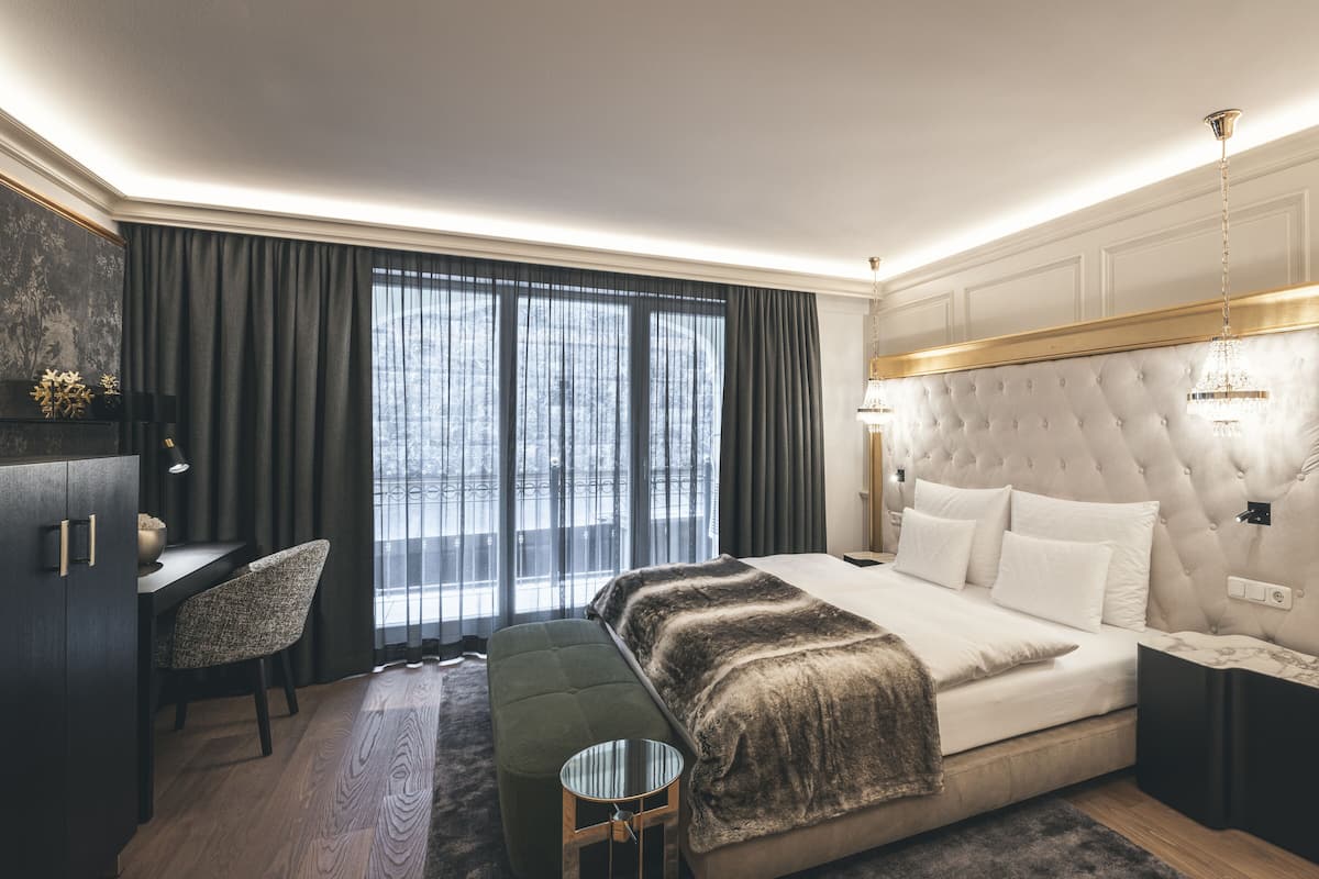 Superior eenpersoonskamer | Luxe beddengoed, donzen dekbedden, een minibar, een kluis op de kamer