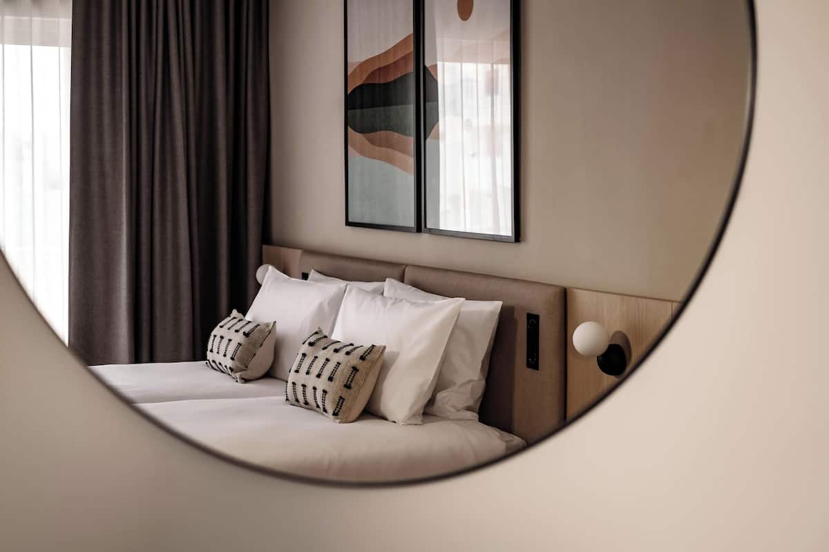 Deluxe Room, 1 Bedroom, City View | 1 bedroom, in-room safe, free WiFi, bed sheets