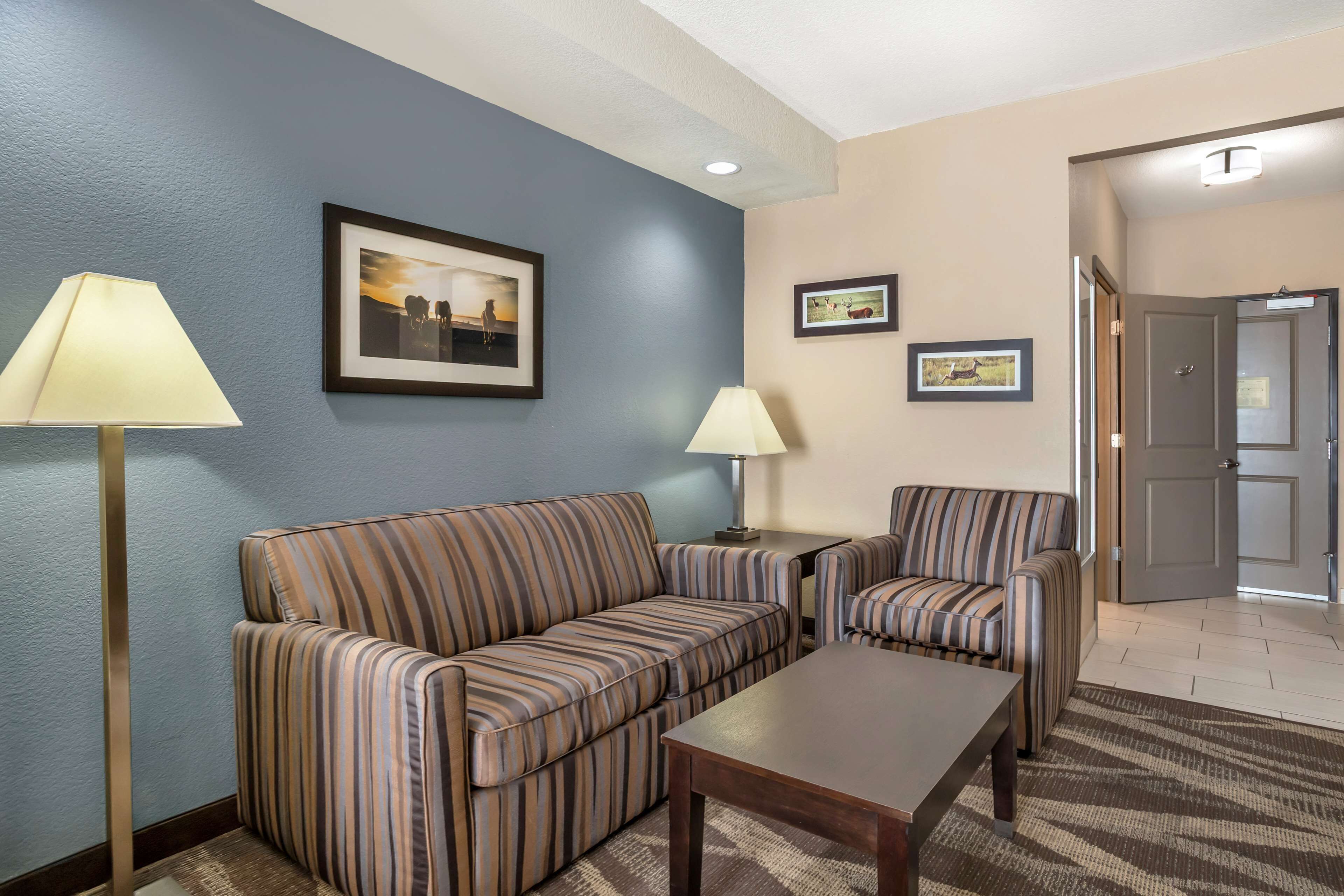 suite, 1 king bed, non smoking, refrigerator & microwave | desk, laptop workspace, iron/ironing board, free cots/infant beds