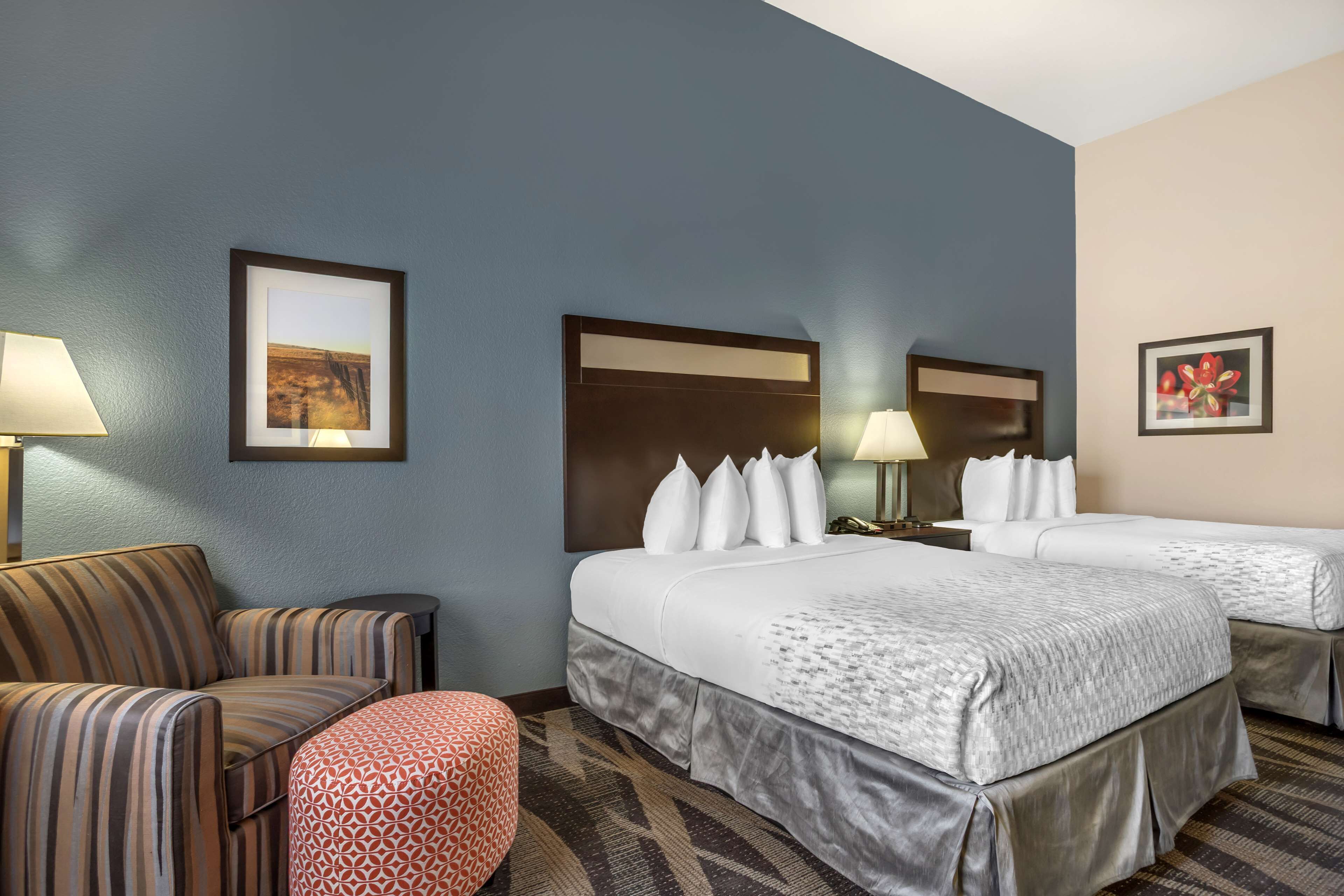 standard room, 2 queen beds, non smoking, refrigerator & microwave | desk, laptop workspace, iron/ironing board, free cots/infant beds