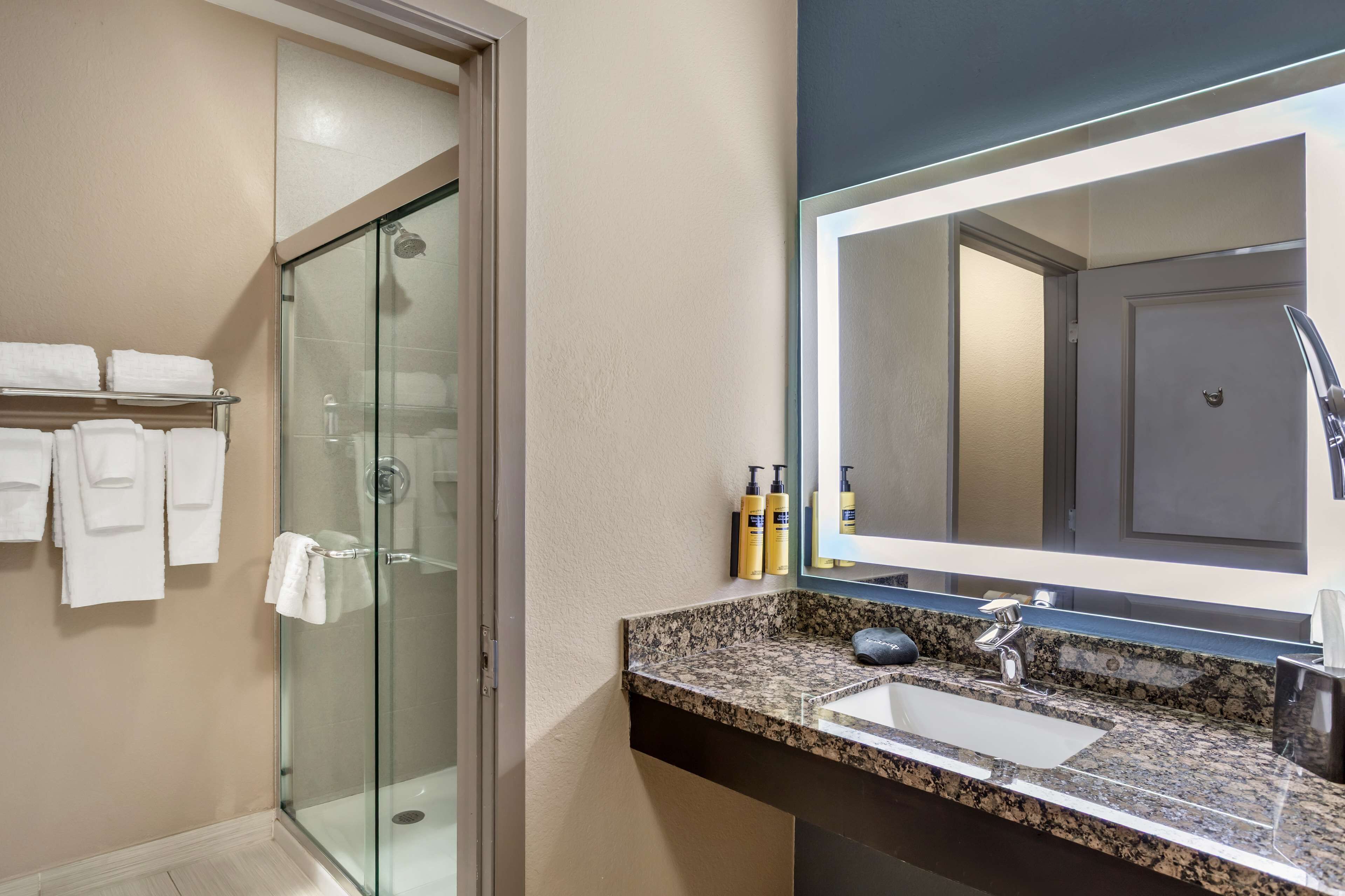 standard room, 1 king bed, non smoking, refrigerator & microwave (oversized room) | bathroom | combined shower/bathtub, free toiletries, hair dryer, towels