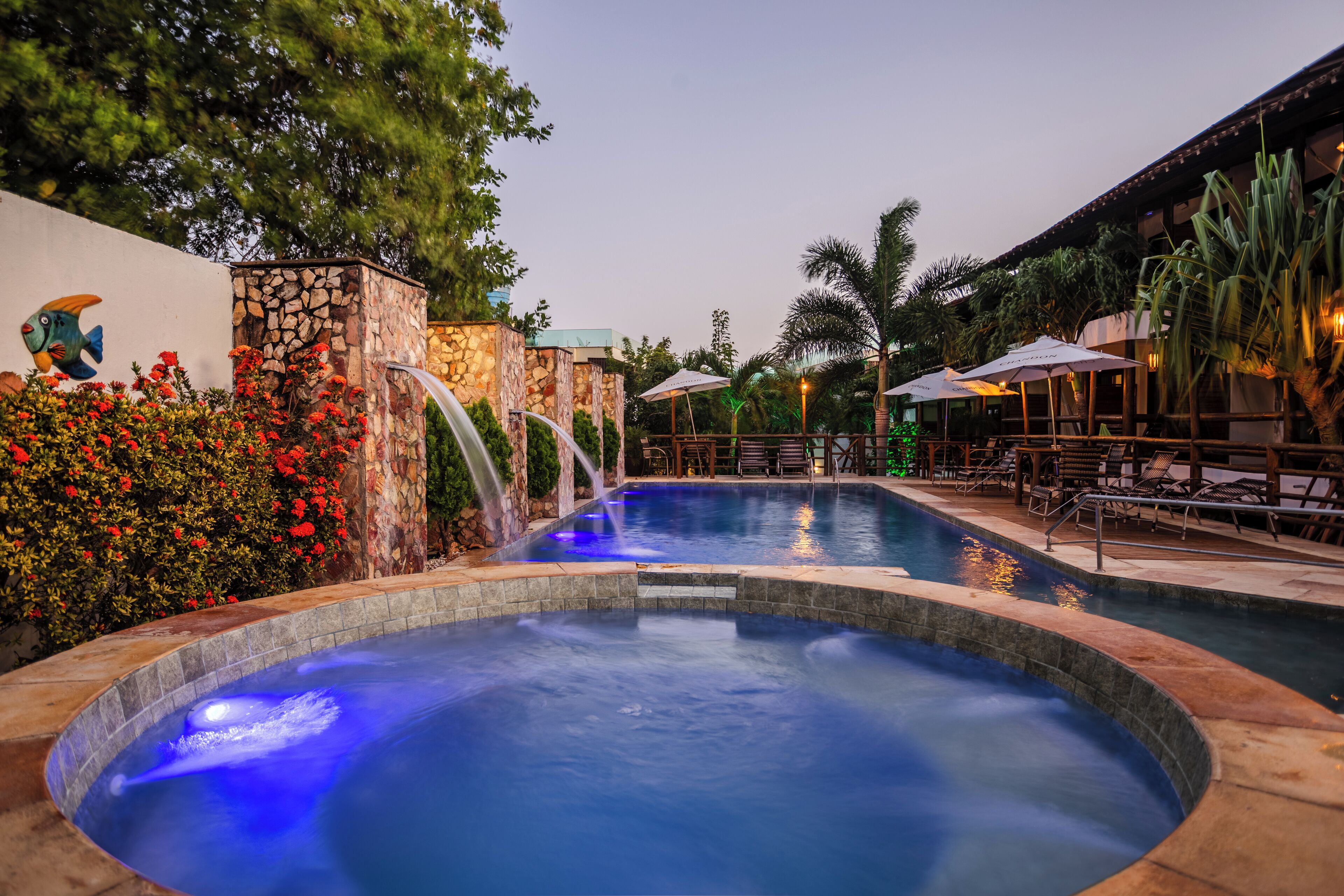 Outdoor pool, open 9:00 AM to 10:00 PM, pool umbrellas, pool loungers