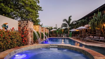 Outdoor pool, open 9:00 AM to 10:00 PM, pool umbrellas, pool loungers