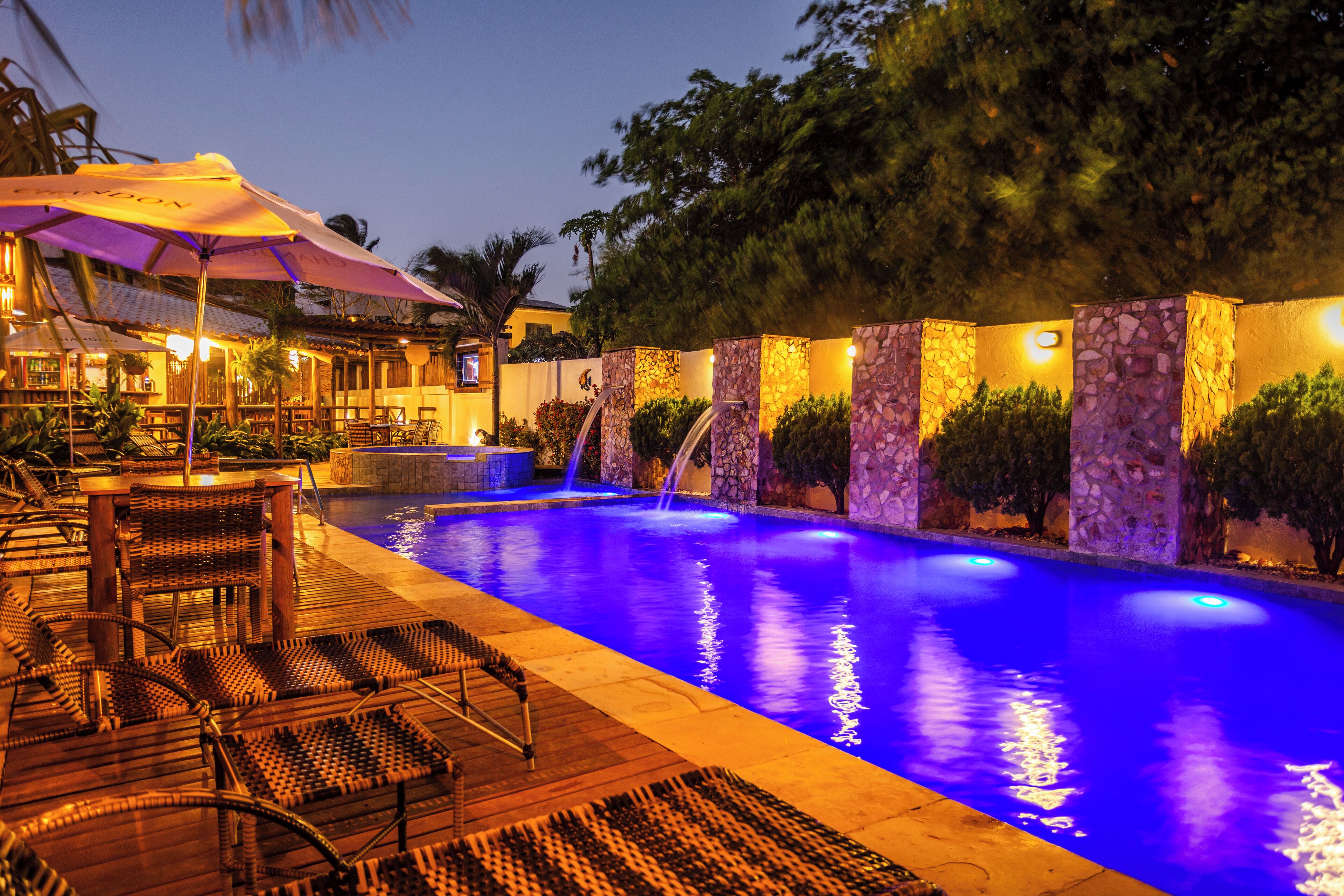 Outdoor pool, open 9:00 AM to 10:00 PM, pool umbrellas, sun loungers