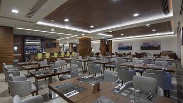 Breakfast, lunch, dinner served; international cuisine