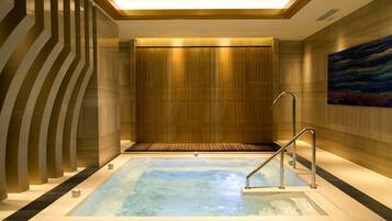 Indoor pool, open 7:30 AM to 10:00 PM, pool loungers