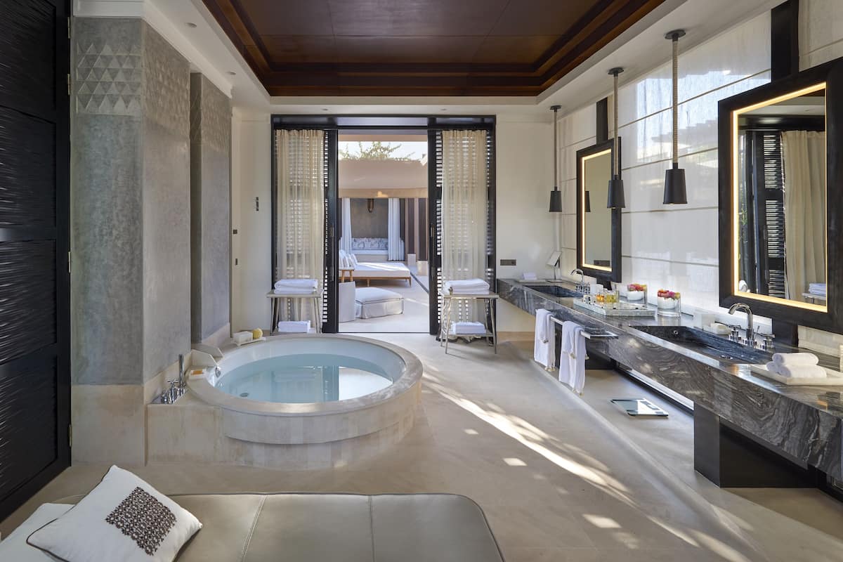 separate bathtub and shower, deep-soaking bathtub, rainfall showerhead