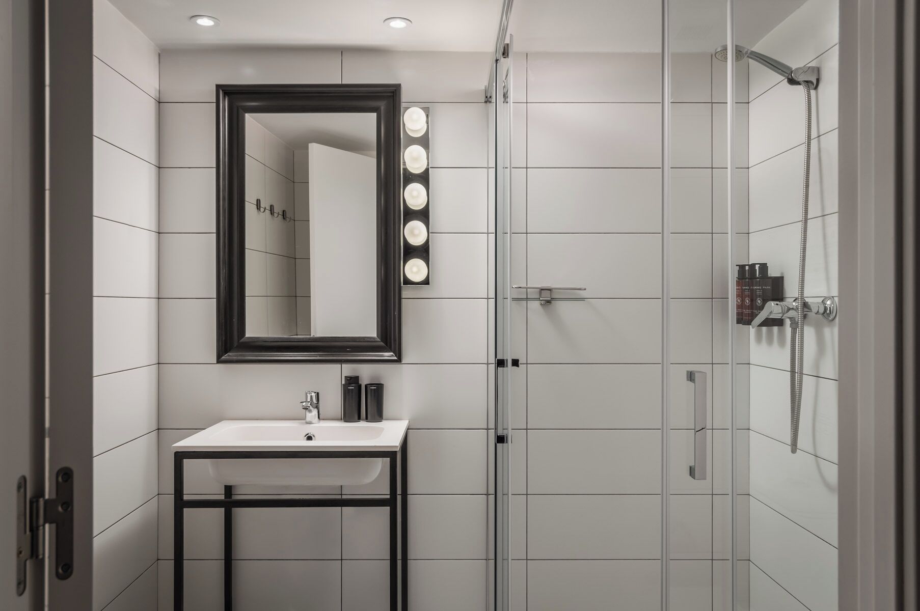 superior double room | bathroom | shower, hair dryer, towels, soap