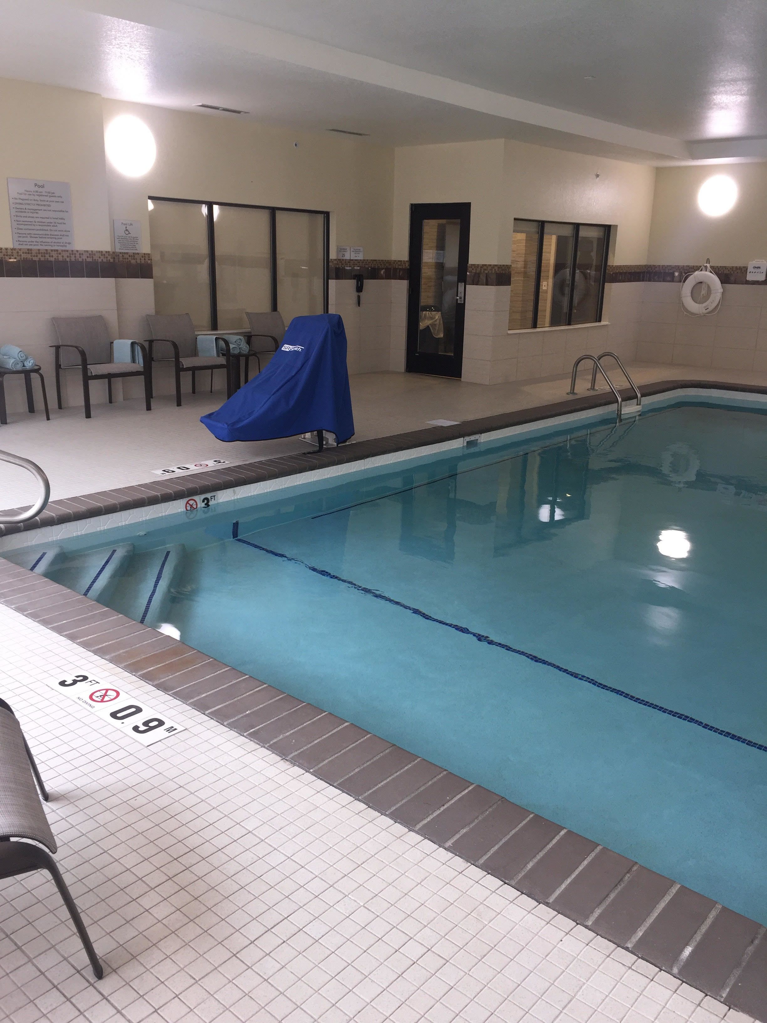 indoor pool, open 6:00 am to 11:00 pm, pool umbrellas, pool loungers