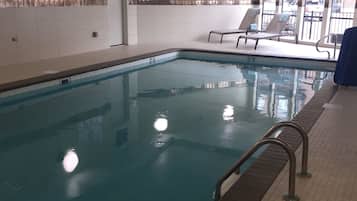 Indoor pool, open 6:00 AM to 11:00 PM, pool umbrellas, sun loungers