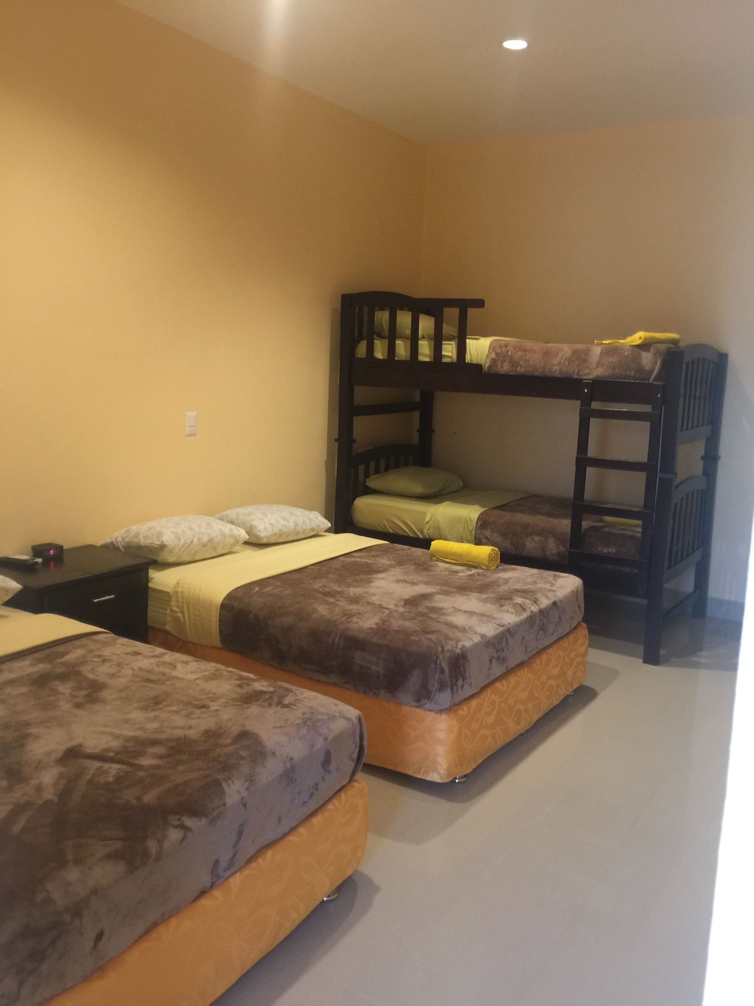 family studio suite, 1 bedroom, private bathroom | desk, free wifi, bed sheets