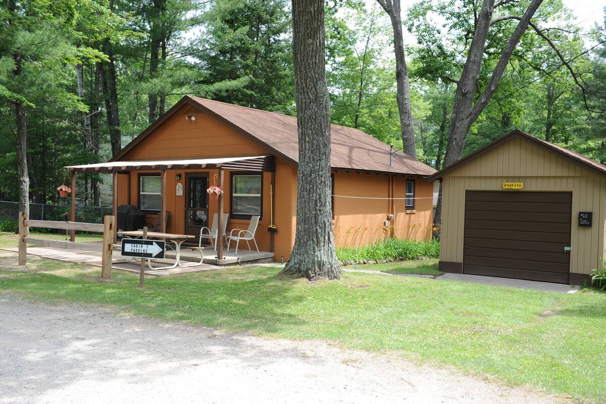 A lodge with a picnic area, a private garage, and a dining area.
