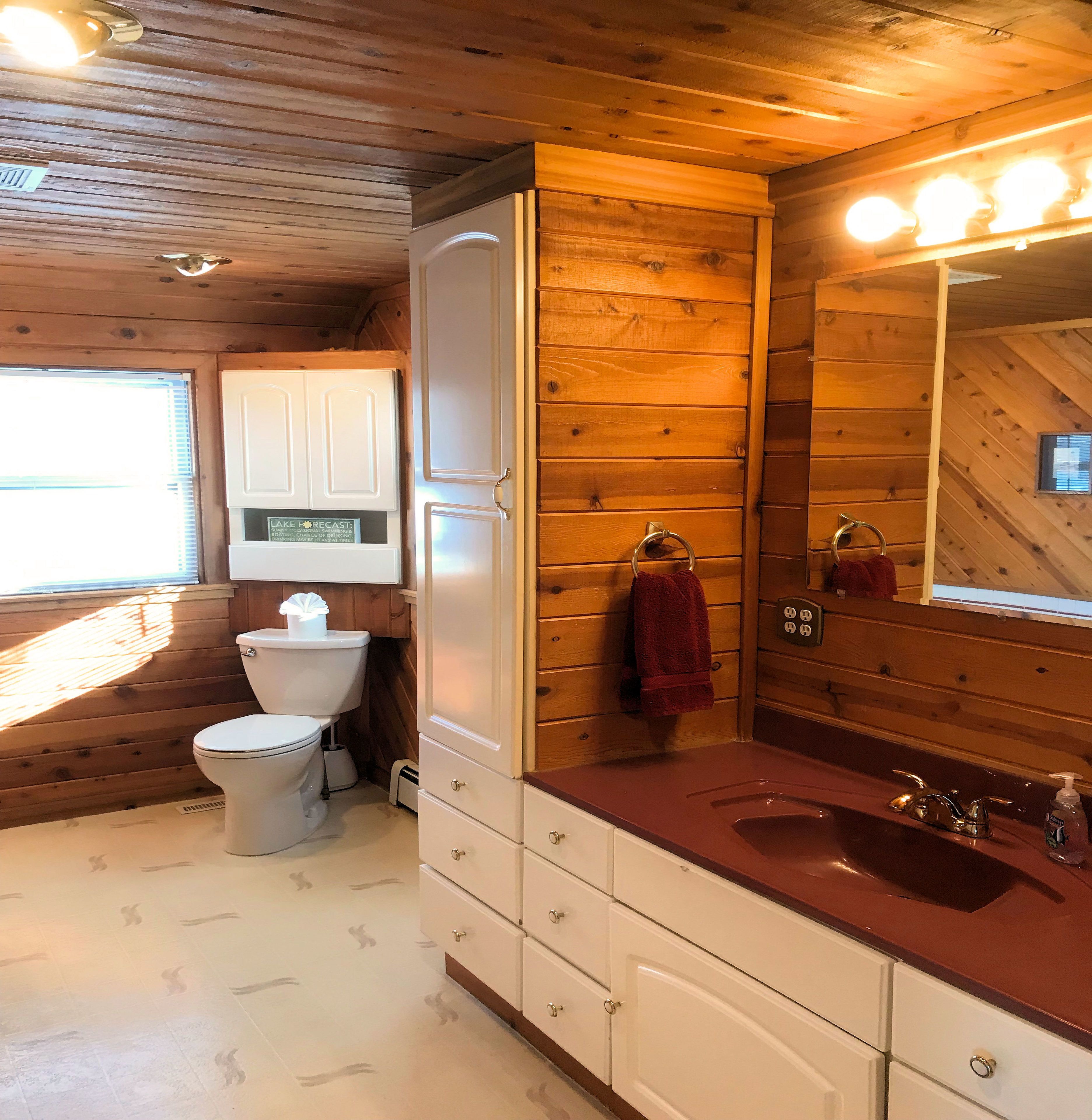 cabin 1, lakefront | bathroom | free toiletries, hair dryer, towels, soap